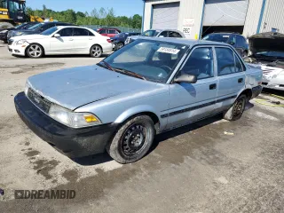 1990 Toyota Corolla z VIN JT2AE94A3L3318946, wystawiony jako Copart lot #59189514 z przebiegiem 115 252 mil mil oraz Czysty tytuł • Clean title. Historia ofert i sprzedaży dostępna na DreamBid. Obrazek 1.