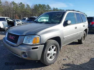 2003 GMC Envoy SLE with VIN 1GKDT13S132377154, listed as a IAAI auction lot 41484891 with 226,008 mi miles. Bid and sale history available at carsss.com. Image 18.