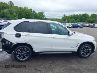 2018 BMW X5 xDrive35i z VIN 5UXKR0C50JL075205, wystawiony jako IAAI lot #42231107 z przebiegiem 38 412 mil mil oraz . Historia ofert i sprzedaży dostępna na DreamBid. Obrazek 14.