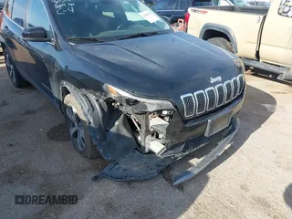 2020 Jeep Cherokee Limited with VIN 1C4PJLDB9LD610338, listed as a IAAI auction lot 42384794 with 120,305 mi miles and . Bid and sale history available at DreamBid. Image 6.