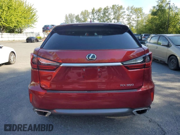 2018 Lexus RX 350 z VIN 2T2BZMCAXJC153384, wystawiony jako Copart lot #58361945 z przebiegiem 12 832 mil mil oraz Szkoda całkowita • Salvage title. Historia ofert i sprzedaży dostępna na DreamBid. Obrazek 6.