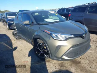 2021 Toyota C-HR LE with VIN NMTKHMBX7MR136498, listed as a IAAI auction lot 41673603 with 88,979 mi miles. Bid and sale history available at carsss.com. Image 1.