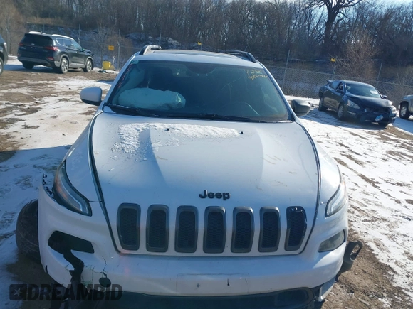 2015 Jeep Cherokee North with VIN 1C4PJMCS7FW792850, listed as a IAAI auction lot 41323432 with 102,642 mi miles. Bid and sale history available at carsss.com. Image 12.
