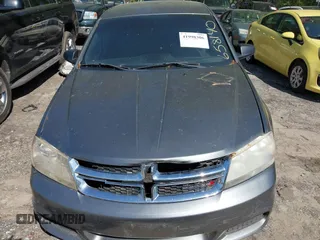 2013 Dodge Avenger SE with VIN 1C3CDZAB1DN658140, listed as a IAAI auction lot 41998306 with 215,548 mi miles. Bid and sale history available at carsss.com. Image 6.