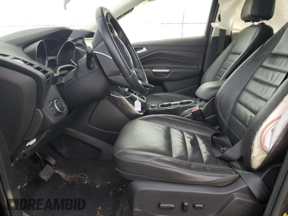 2016 Ford Escape Titanium with VIN 1FMCU0J9XGUA30359, listed as a Copart auction lot 89178985 with 148,718 mi miles and Salvage Title. Bid and sale history available at carsss.com. Image 7.