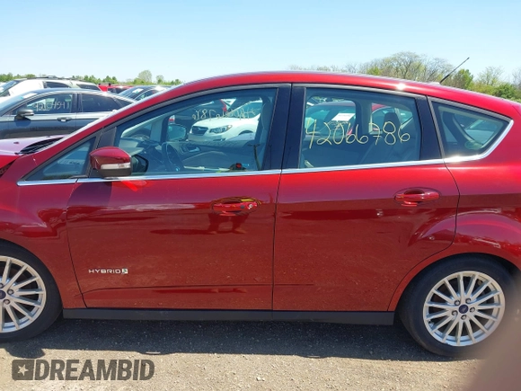 2013 Ford C-Max SEL z VIN 1FADP5BU1DL520745, wystawiony jako IAAI lot #42066786 z przebiegiem 64 213 mil mil oraz . Historia ofert i sprzedaży dostępna na DreamBid. Obrazek 14.