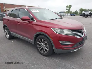 2015 Lincoln MKC with VIN 5LMCJ1A97FUJ30994, listed as a IAAI auction lot 42159219 with 180,802 mi miles. Bid and sale history available at carsss.com. Image 1.