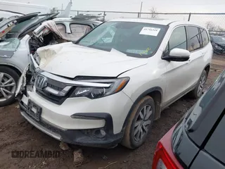 2019 Honda Pilot EX-L with VIN 5FNYF6H59KB032437, listed as a IAAI auction lot 41716318 with 103,556 mi miles. Bid and sale history available at carsss.com. Image 2.