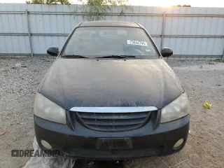 2005 Kia Spectra with VIN KNAFE161255088283, listed as a Copart auction lot 73654744 with 169,947 mi miles and Salvage Title. Bid and sale history available at carsss.com. Image 5.