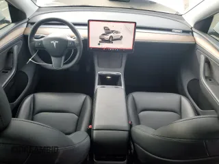 2023 Tesla Model Y Long Range with VIN 7SAYGDEE3PA130988, listed as a Copart auction lot 42172185 with 112,136 mi miles and Salvage Title. Bid and sale history available at DreamBid. Image 8.