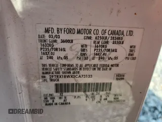 2003 Ford F-150 XL z VIN 2FTRX18WX3CA73133, wystawiony jako Copart lot #58734795 z przebiegiem 197 519 mil mil oraz Szkoda całkowita • Salvage title. Historia ofert i sprzedaży dostępna na DreamBid. Obrazek 13.