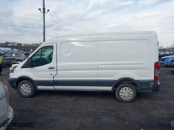 2016 Ford Transit Van with VIN 1FTYE2CMXGKA31057, listed as a IAAI auction lot 41598779 with NaN miles. Bid and sale history available at carsss.com. Image 14.
