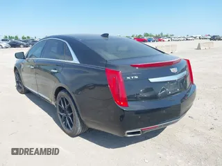 2017 Cadillac XTS Luxury with VIN 2G61M5S39H9161089, listed as a IAAI auction lot 42005971 with 106,532 mi miles. Bid and sale history available at carsss.com. Image 3.