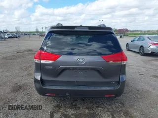 2012 Toyota Sienna LE AAS with VIN 5TDKK3DC5CS270481, listed as a IAAI auction lot 42093687 with 208,899 mi miles. Bid and sale history available at carsss.com. Image 16.