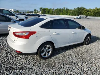 2014 Ford Focus SE with VIN 1FADP3F27EL412368, listed as a Copart auction lot 51463155 with 143,484 mi miles and Salvage Title. Bid and sale history available at DreamBid. Image 3.