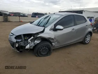 2013 Mazda Mazda2 Sport with VIN JM1DE1KZ2D0166000, listed as a Copart auction lot 50998665 with 97,049 mi miles and Salvage Title. Bid and sale history available at carsss.com. Image 1.