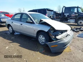 1999 Saturn SL with VIN 1G8ZH5281XZ376254, listed as a IAAI auction lot 41857372 with 229,836 mi miles. Bid and sale history available at carsss.com. Image 1.