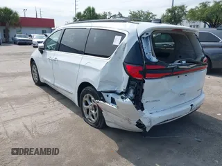 2023 Chrysler Pacifica Limited with VIN 2C4RC1GG7PR566163, listed as a IAAI auction lot 42393988 with 59,354 mi miles and . Bid and sale history available at DreamBid. Image 3.