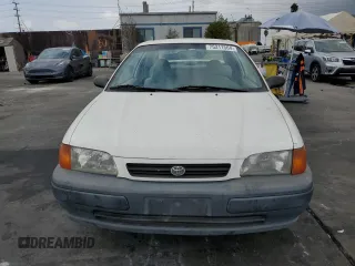 1996 Toyota Tercel DX z VIN JT2AC52L9T0189356, wystawiony jako Copart lot #75311564 z przebiegiem 155 248 mil mil oraz Szkody całkowita. Historia ofert i sprzedaży dostępna na DreamBid. Obrazek 5.