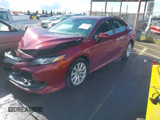 2020 Toyota Camry LE with VIN 4T1C11AK4LU916494, listed as a IAAI auction lot 41786429 with 100,032 mi miles and . Bid and sale history available at DreamBid. Image 17.