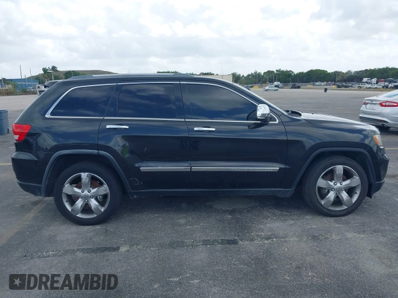 2012 Jeep Grand Cherokee Overland with VIN 1C4RJECT4CC299549, listed as a IAAI auction lot 41917306 with 229,256 mi miles. Bid and sale history available at carsss.com. Image 13.