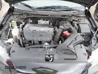 2011 Mitsubishi Lancer GTS with VIN JA32U8FW0BU005510, listed as a IAAI auction lot 41678936 with 204,511 mi miles. Bid and sale history available at carsss.com. Image 10.