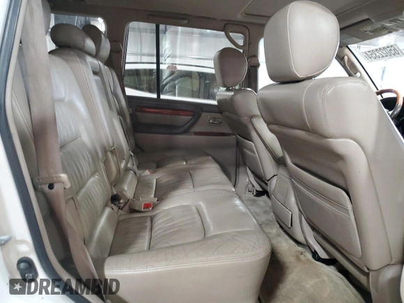 2000 Lexus LX 470 z VIN JT6HT00W9Y0109333, wystawiony jako Copart lot #47589965 z przebiegiem 261 766 mil mil oraz Szkody całkowita. Historia ofert i sprzedaży dostępna na DreamBid. Obrazek 11.