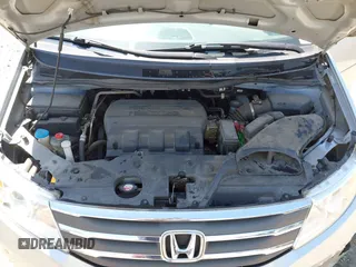 2012 Honda Odyssey Touring with VIN 5FNRL5H96CB043939, listed as a IAAI auction lot 41983643 with 202,535 mi miles. Bid and sale history available at carsss.com. Image 10.