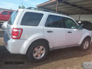 2009 Ford Escape Hybrid with VIN 1FMCU49399KC19803, listed as a IAAI auction lot 42004776 with 163,353 mi miles and . Bid and sale history available at DreamBid. Image 13.