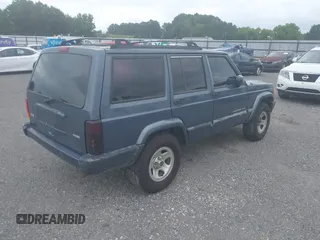 2001 Jeep Cherokee Sport with VIN 1J4FT48S61L594229, listed as a IAAI auction lot 42520336 with 190,862 mi miles and . Bid and sale history available at DreamBid. Image 4.