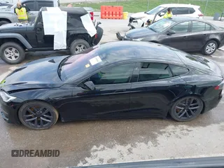 2022 Tesla Model S Plaid with VIN 5YJSA1E60NF460244, listed as a IAAI auction lot 41996403 with Not provided miles and . Bid and sale history available at DreamBid. Image 14.