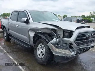 2018 Toyota Tacoma SR with VIN 5TFAX5GN4JX127924, listed as a IAAI auction lot 42359646 with 53,886 mi miles and . Bid and sale history available at DreamBid. Image 1.