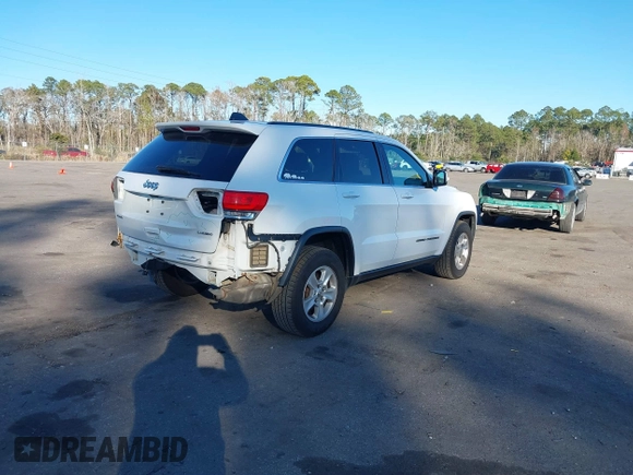 2017 Jeep Grand Cherokee Laredo with VIN 1C4RJFAG7HC688625, listed as a IAAI auction lot 41295860 with 115,714 mi miles. Bid and sale history available at carsss.com. Image 4.