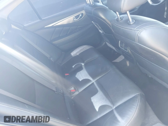 2014 Infiniti Q50 Sport with VIN JN1BV7AR4EM689009, listed as a IAAI auction lot 41990992 with 131,071 mi miles and . Bid and sale history available at DreamBid. Image 8.
