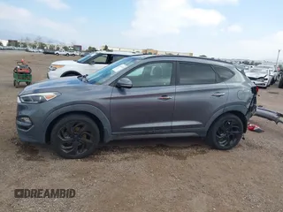 2016 Hyundai Tucson Eco with VIN KM8J3CA28GU217033, listed as a IAAI auction lot 41476238 with 76,311 mi miles. Bid and sale history available at carsss.com. Image 15.