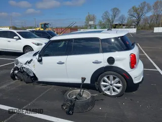 2016 MINI Countryman S with VIN WMWZC3C51GWT10458, listed as a IAAI auction lot 41878799 with 112,019 mi miles and . Bid and sale history available at DreamBid. Image 14.