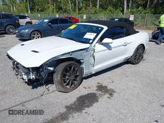 2019 Ford Mustang EcoBoost z VIN 1FATP8UHXK5205196, wystawiony jako IAAI lot #41688651 z przebiegiem 75 642 mil mil oraz . Historia ofert i sprzedaży dostępna na DreamBid. Obrazek 2.