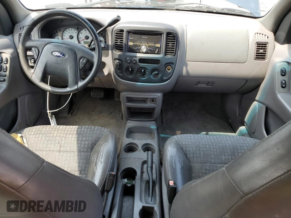 2001 Ford Escape XLS с VIN 1FMYU02161KA58399, выставлен на аукционе Copart как лот 58973115 с пробегом 221 560 миль миль и Списание • Salvage title. История ставок и продаж доступна на DreamBid. Изображение 8.