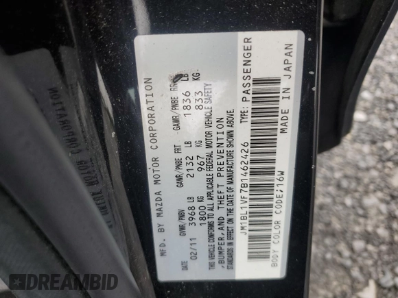 2011 Mazda 3 i Touring with VIN JM1BL1VF7B1462426, listed as a Copart auction lot 56901425 with 94,964 mi miles and Salvage title. Bid and sale history available at DreamBid. Image 12.