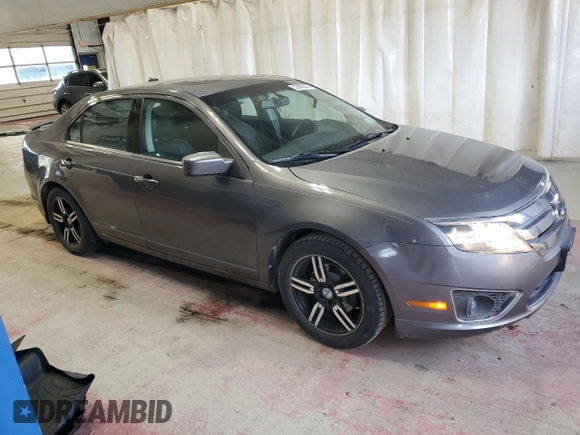2012 Ford Fusion SEL with VIN 3FAHP0JA1CR281869, listed as a Copart auction lot 52486365 with 124,312 mi miles and Salvage Title. Bid and sale history available at carsss.com. Image 4.