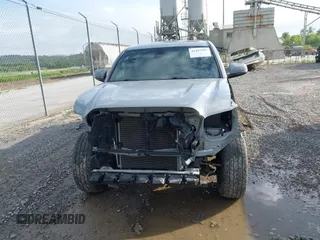 2021 Toyota Tacoma SR with VIN 5TFCZ5AN7MX255512, listed as a IAAI auction lot 42497907 with 50,563 mi miles and . Bid and sale history available at DreamBid. Image 13.
