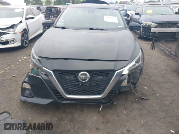 2019 Nissan Altima SV with VIN 1N4BL4DV4KC122929, listed as a IAAI auction lot 42126187 with 146,842 mi miles and . Bid and sale history available at DreamBid. Image 6.
