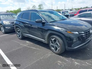 2022 Hyundai Tucson Hybrid SEL Convenience with VIN KM8JFCA17NU051776, listed as a IAAI auction lot 42018560 with 81,206 mi miles. Bid and sale history available at carsss.com. Image 1.