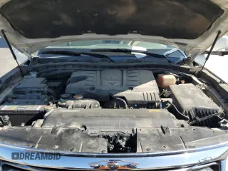 2012 Infiniti QX56 7-passenger with VIN JN8AZ2NE1C9017744, listed as a Copart auction lot 52988725 with 142,820 mi miles and Salvage title. Bid and sale history available at DreamBid. Image 12.