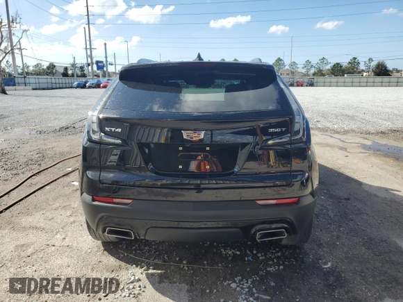 2021 Cadillac XT4 FWD Sport with VIN 1GYFZER44MF080872, listed as a Copart auction lot 86344534 with 23,865 mi miles and Salvage Title. Bid and sale history available at DreamBid. Image 6.