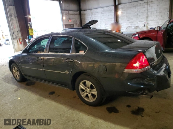 2015 Chevrolet Impala LS with VIN 2G1WA5E36F1171137, listed as a Copart auction lot 63060935 with 148,000 mi miles and Salvage title. Bid and sale history available at DreamBid. Image 2.
