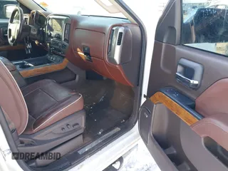 2014 Chevrolet Silverado 1500 High Country with VIN 3GCUKTEC1EG529203, listed as a IAAI auction lot 41643824 with 153,176 mi miles and . Bid and sale history available at DreamBid. Image 5.