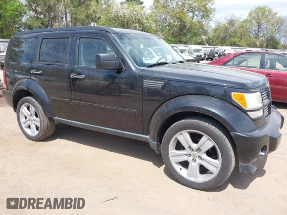 2011 Dodge Nitro Heat with VIN 1D4PT4GX2BW554188, listed as a IAAI auction lot 41882423 with 167,039 mi miles and . Bid and sale history available at DreamBid. Image 1.
