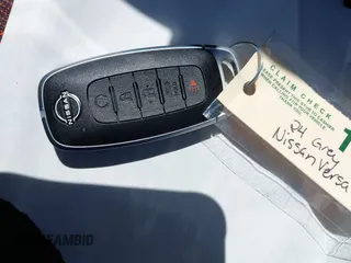 2024 Nissan Versa SR z VIN 3N1CN8FV9RL865083, wystawiony jako IAAI lot #42193458 z przebiegiem 5 774 mil mil oraz . Historia ofert i sprzedaży dostępna na DreamBid. Obrazek 11.