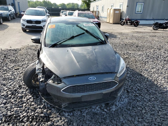 2016 Ford Focus SE z VIN 1FADP3F24GL313333, wystawiony jako Copart lot #60023715 z przebiegiem Nie podano mil oraz Szkoda całkowita • Salvage title. Historia ofert i sprzedaży dostępna na DreamBid. Obrazek 5.